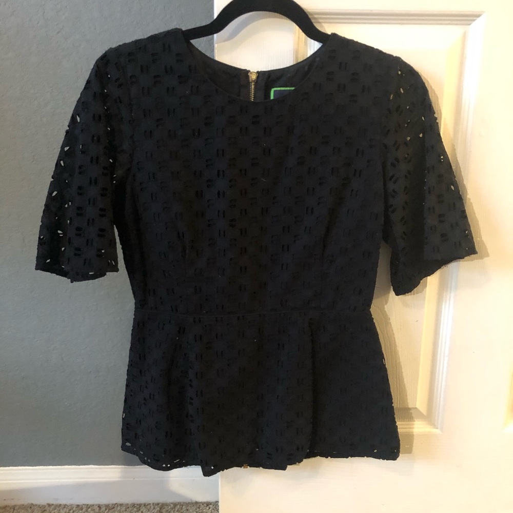 Black blouse with gold zipper down the back